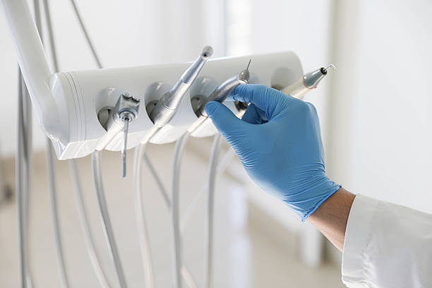 Professional Root Canal Treatment technician working in Flowery Branch, GA